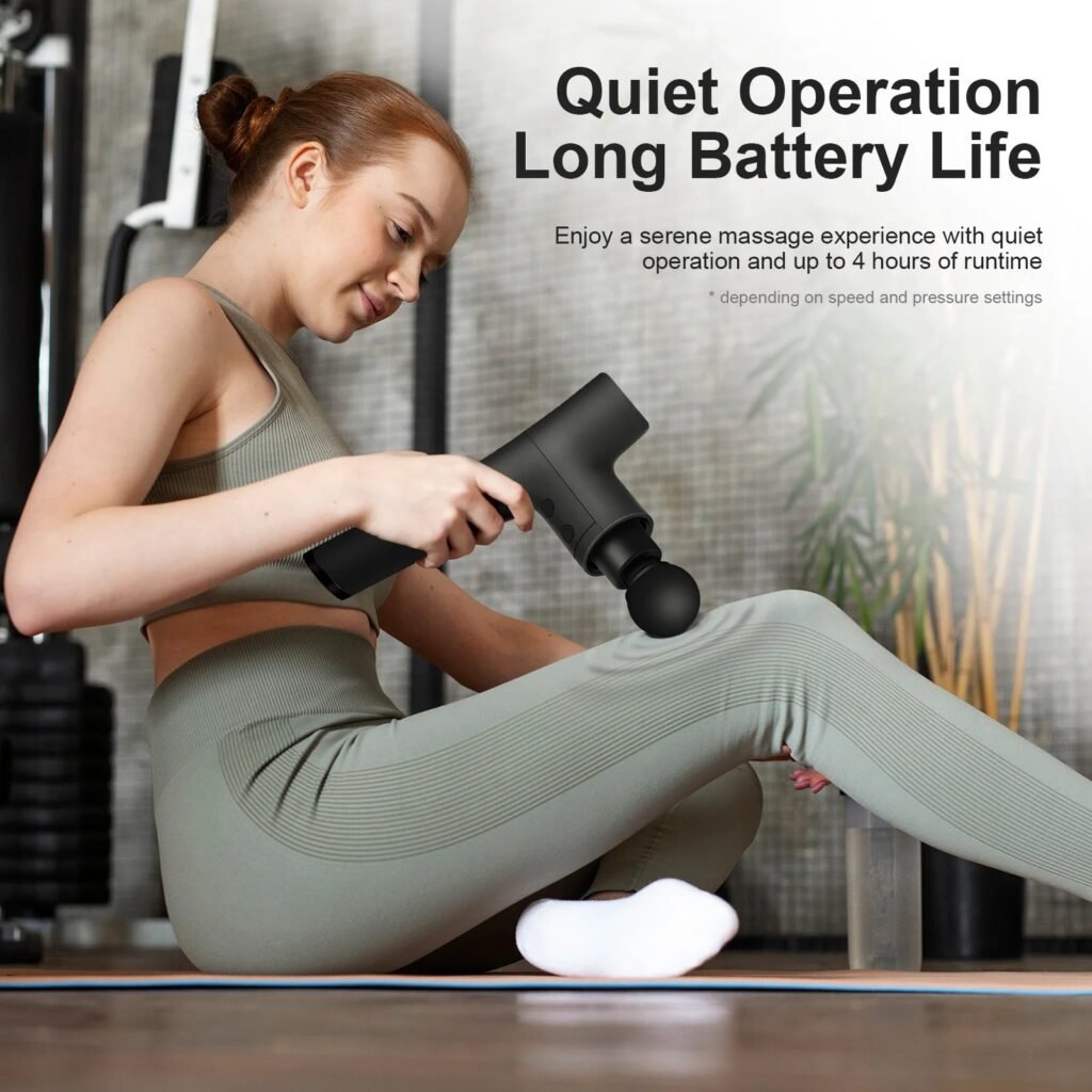 handheld massage gun being used on shoulder