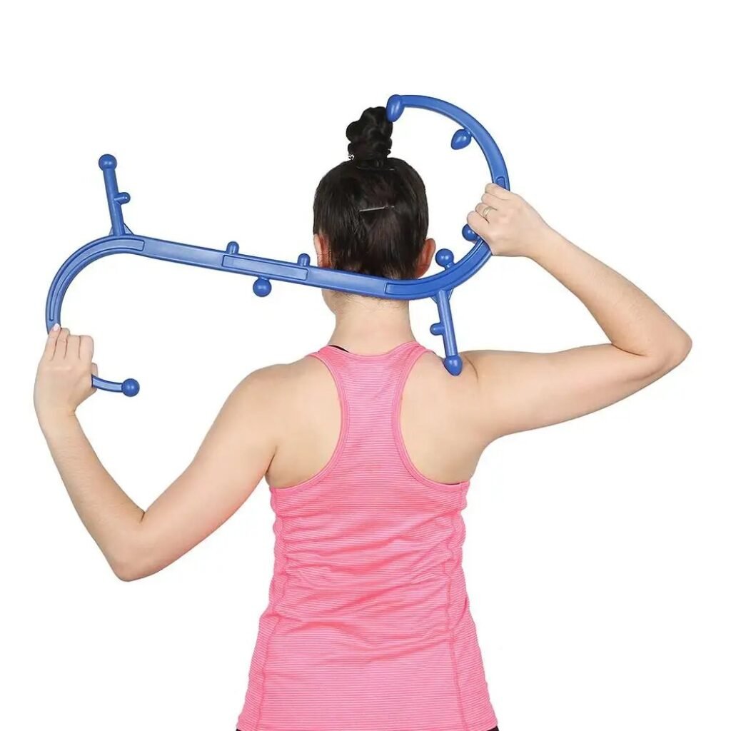 trigger point massage cane being used on upper back for deep relief